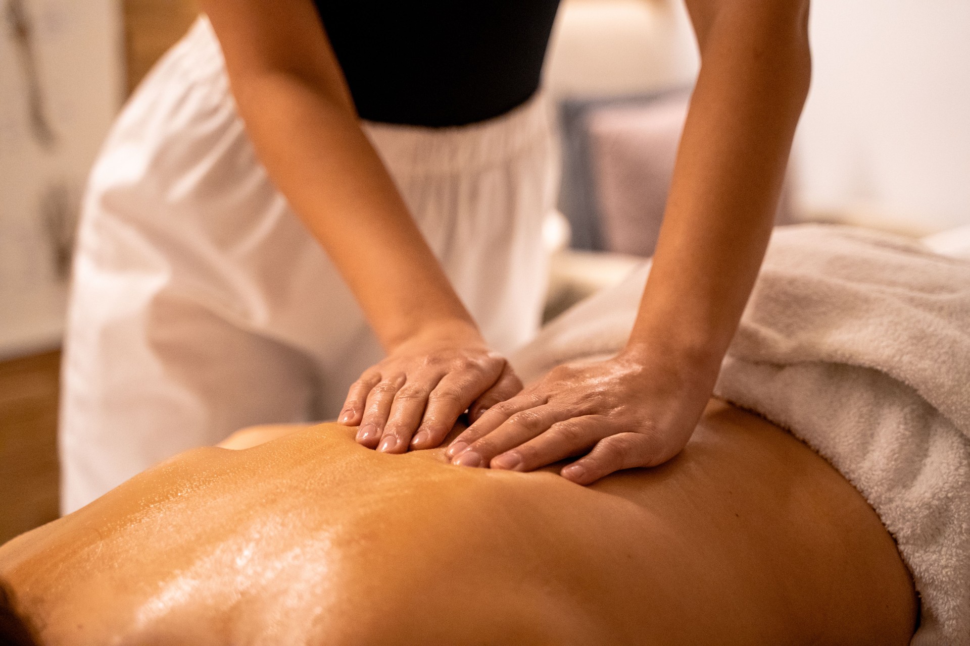 man getting a massage on a massage table